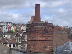 chimney with algae and sky line