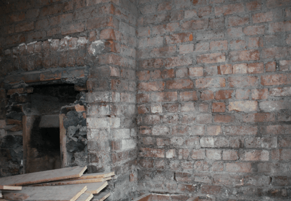 Exposed damp chimney