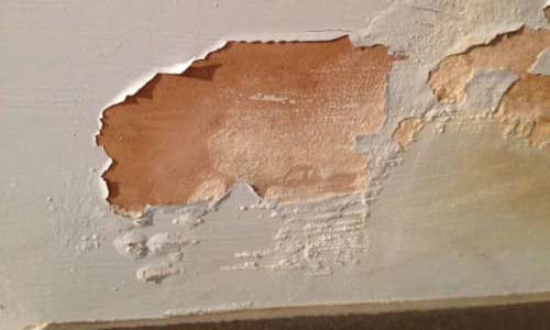 salts from rising damp on wall