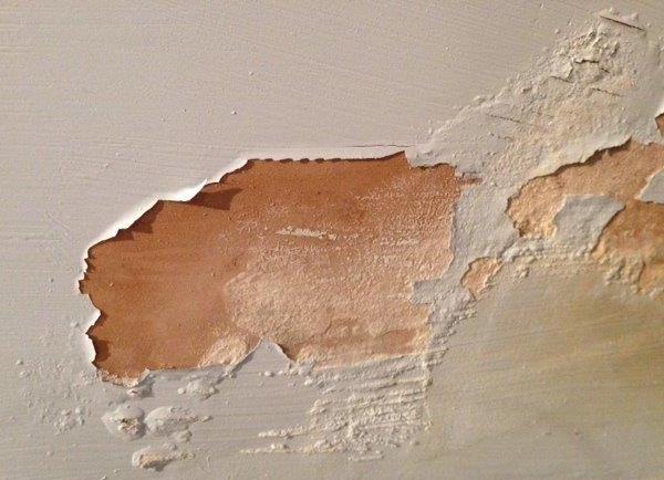 Plaster damage on interior wall